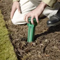 termite bait station being installed by a technician